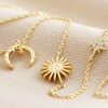 Close Up of Sun and Moon Chain Necklace in Gold