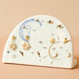 Sun and Moon Ceramic Earring Holder on Pink Background