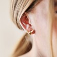 Gold and Enamel Bumblebee Stud Earrings on model