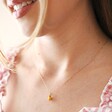 Model Wearing Enamel Lemon Pendant Necklace in Gold
