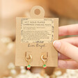 Enamel Strawberry Huggie Hoop Earrings in Gold in packaging