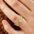 Close Up of Model Wearing Enamel Flower Ring in Gold
