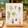 Illustrated Plant Greeting Card lying on a stand