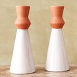 Two Candlestick Holders Side by Side