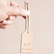 Model Holding Pink Personalised Constellation Leather Luggage Tag