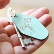 Model Holding Green Personalised Handwriting Leather Tag Keyring with Key
