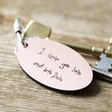 Pink Personalised Handwriting Leather Tag Keyring with Keys on Wooden Table