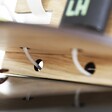 Close Up of Cable Slots on the Personalised The Legend Wooden Accessory Stand