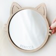 Model Arranging Personalised Wooden Cat Frame Mirror on White Wall