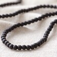 Close Up of Men's Onyx Stone Bead Necklace in Matte Black