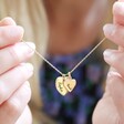 Model Holding Sentimental Personalised Double Heart Charm Necklace From Lisa Angel