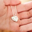 model holding personalised sterling silver heart charm necklace with swarovski crystal