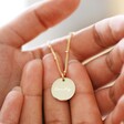 Model Holding Personalised Name Sterling Silver Disc Necklace