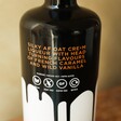 Back of Dirty Cow 70cl Caramel Bombshell Cre*m Liqueur Bottle