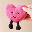 Model Holding Jellycat Amuseable Hot Pink Heart Soft Toy
