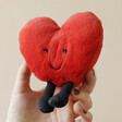Jellycat Amuseable Red Heart Soft Toy in a model's hand