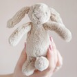 Model Holding Jellycat Bashful Beige Bunny Baby Soft Toy