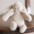 Jellycat Bashful Beige Bunny Baby Soft Toy on Wooden Chair