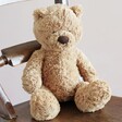 Jellycat Bumbly Bear Soft Toy on Wooden Chair