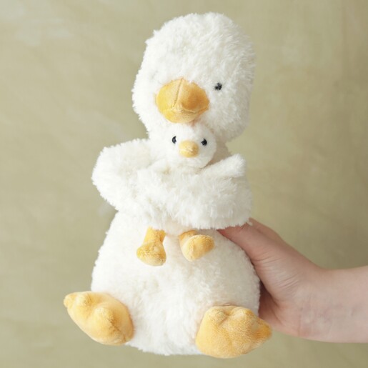Jellycat Huddles Duck Soft Toy Model Holding Jellycat Huddles Duck Soft Toy