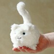 Model Holding Jellycat Kitten Caboodle Soft Toy in Cream