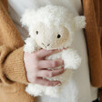 model holding Jellycat Little Lamb Soft Toy