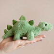 Model Holding Jellycat Mini Fossilly Stegosaurus Soft Toy