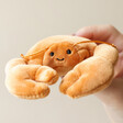 Model Holding Jellycat Sensational Crab Soft Toy