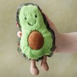 Model Holding Jellycat Small Amuseable Avocado Soft Toy