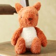 Jellycat Tumbletuft Squirrel Soft Toy on chair