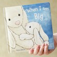 Model holding Jellycat When I am Big Book