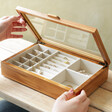 Model Lifting Lid on the Large Glass Top Wooden Jewellery Box