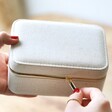 Model Fastening the Natural Cotton Jewellery Case