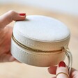 Model Holding Round Natural Cotton Jewellery Case