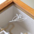 Close Up of Engraving on Personalised Birth Flower Glass Top Wooden Jewellery Box