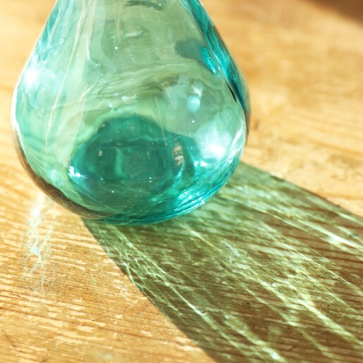 Close up of Recycled Blue Glass Bud Vase
