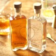 Personalised Pair of 20cl Heart Outline Couples' Spirit Bottles on Table