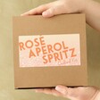model holding Rosé Aperol Spritz Cocktail Kit