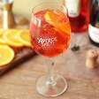 Aperol Spritz Cocktail Glasses in front of cocktail kit