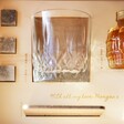 Etched glass, 3 whisky stones and edge of whisky bottle