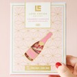 Model Holding Love Cocoa Strawberry Champagne White Chocolate Bar