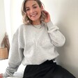 Blonde Model Wearing Grey Leopard Print Wording Sweatshirt