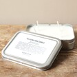 Norfolk Natural Living Yoga Travel Candle with Lid off on Wooden Table