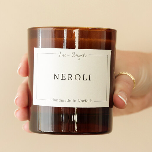 Model Holding Lisa Angel Neroli Scented Soy Candle