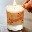 Model Lighting Valentine's Day Cupid Scented Soy Candle