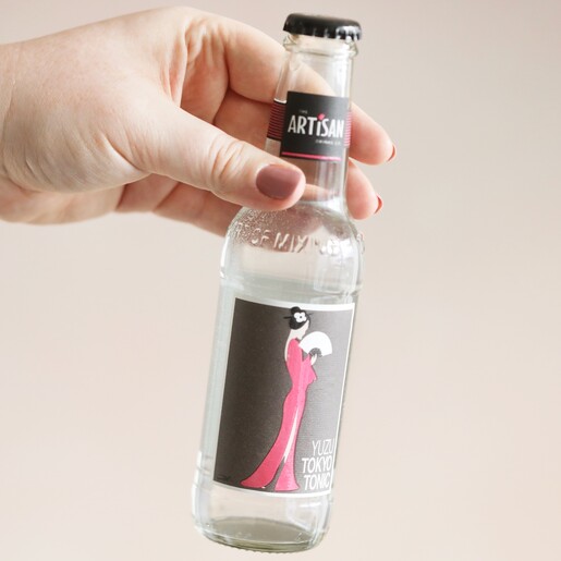 Model Holding The Artisan Drinks Co. Yuzu Tokyo Tonic