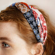 close up of model wearing Patterned Twist Fabric Headband