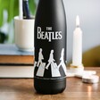 Close Up of House of Disaster The Beatles Abbey Road Drinks Bottle