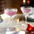 Two Art Deco Coupe Glasses set on a table