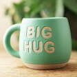 Sass & Belle Big Hug Mug in Green on Wooden Table